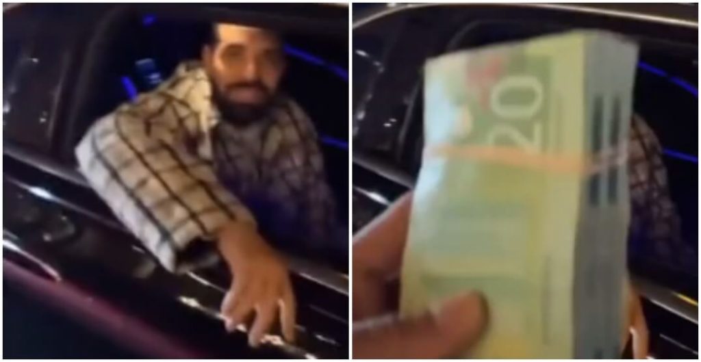 Drake distribuiu dinheiro no natal - Camões Rádio - Toronto